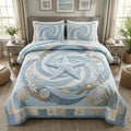 Sea Star Serenade quilted 3-piece bedding set on a made bed with two matching pillow shams