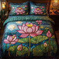 Serene Lotus Elegance quilted 3-piece bedding set on a made bed with two matching pillow shams
