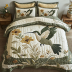Serenity Stitch quilted 3-piece bedding set on a made bed with two matching pillow shams