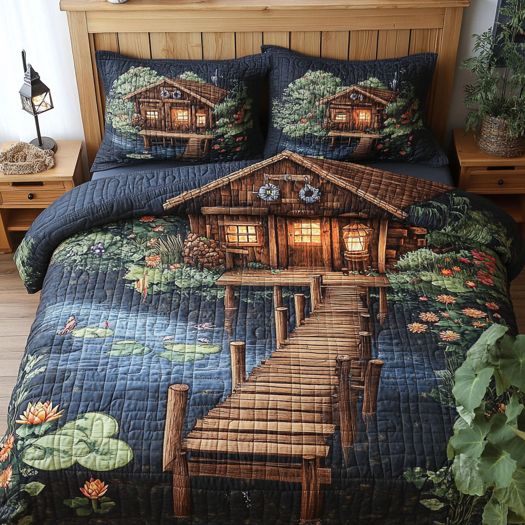 Shimmering Shore Shack quilted 3-piece bedding set on a made bed with two matching pillow shams