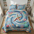 Shoreline Stars quilted 3-piece bedding set on a made bed with two matching pillow shams
