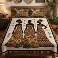 Sister Bloom quilted 3-piece bedding set on a made bed with two matching pillow shams