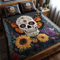 Skull Bloom Halloween quilted 3-piece bedding set on a made bed with two matching pillow shams