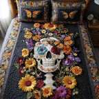 Skull Blossom Halloween quilted 3-piece bedding set on a made bed with two matching pillow shams