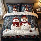 Snowman Joy Bedspreads quilted 3-piece bedding set on a made bed with two matching pillow shams