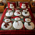 Snowy Friends Snowman quilted 3-piece bedding set on a made bed with two matching pillow shams