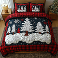 Snowy Pines quilted 3-piece bedding set on a made bed with two matching pillow shams