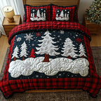Snowy Pines quilted 3-piece bedding set on a made bed with two matching pillow shams