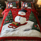 Snowy Sleigh Ride Christmas quilted 3-piece bedding set on a made bed with two matching pillow shams