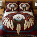 Soul Snare quilted 3-piece bedding set on a made bed with two matching pillow shams