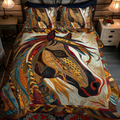 Southwest Canter quilted 3-piece bedding set on a made bed with two matching pillow shams