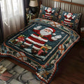 Sparkling Snowy Santa quilted 3-piece bedding set on a made bed with two matching pillow shams