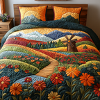 Spinning In The Breeze quilted 3-piece bedding set on a made bed with two matching pillow shams