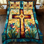 Spiritual Cross quilted 3-piece bedding set on a made bed with two matching pillow shams