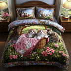 Springtime Kittens quilted 3-piece bedding set on a made bed with two matching pillow shams