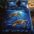 Starry Sea Turtles quilted 3-piece bedding set on a made bed with two matching pillow shams