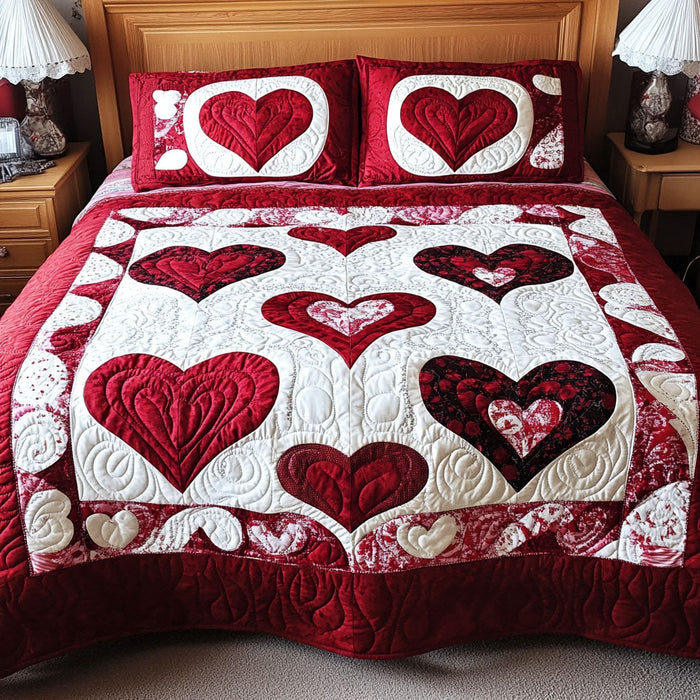 Sweetheart Harmony quilted 3-piece bedding set on a made bed with two matching pillow shams