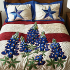 Texas Breeze quilted 3-piece bedding set on a made bed with two matching pillow shams