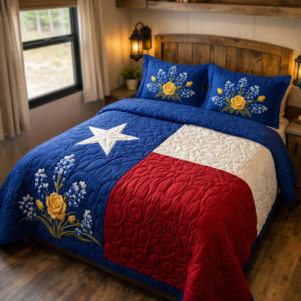 Texas Heritage Blue Bonnet quilted 3-piece bedding set on a made bed with two matching pillow shams