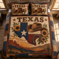 Texas Spirit Bluebonnets quilted 3-piece bedding set on a made bed with two matching pillow shams