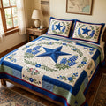 Texas Wildflowers quilted 3-piece bedding set on a made bed with two matching pillow shams
