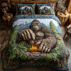 Trail Stalker quilted 3-piece bedding set on a made bed with two matching pillow shams