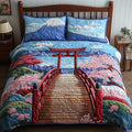 Tranquil Fuji quilted 3-piece bedding set on a made bed with two matching pillow shams