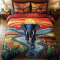 Tribal Elephant quilted 3-piece bedding set on a made bed with two matching pillow shams