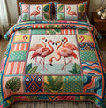 Tropical Flamingo quilted 3-piece bedding set on a made bed with two matching pillow shams