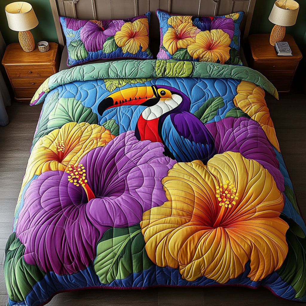 Tropical Toucan quilted 3-piece bedding set on a made bed with two matching pillow shams