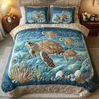 Turtle Drift quilted 3-piece bedding set on a made bed with two matching pillow shams