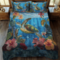 Turtle Serenity quilted 3-piece bedding set on a made bed with two matching pillow shams