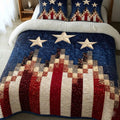 Union Spirit quilted 3-piece bedding set on a made bed with two matching pillow shams