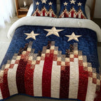 Union Spirit quilted 3-piece bedding set on a made bed with two matching pillow shams