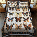Vibrant Butterflies quilted 3-piece bedding set on a made bed with two matching pillow shams