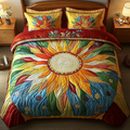 Vibrant Sunflower Glow quilted 3-piece bedding set on a made bed with two matching pillow shams