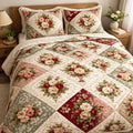 Vintage Bouquet Flower quilted 3-piece bedding set on a made bed with two matching pillow shams