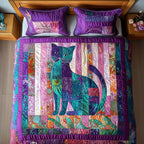 Whimsical Cat Patchwork quilted 3-piece bedding set on a made bed with two matching pillow shams