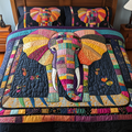 Wild Harmony Animal quilted 3-piece bedding set on a made bed with two matching pillow shams