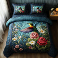 Winged Blossom quilted 3-piece bedding set on a made bed with two matching pillow shams