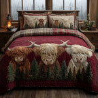 Winter Cow Animal quilted 3-piece bedding set on a made bed with two matching pillow shams