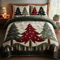 Winter Light Christmas quilted 3-piece bedding set on a made bed with two matching pillow shams