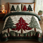 Winter Light Christmas quilted 3-piece bedding set on a made bed with two matching pillow shams